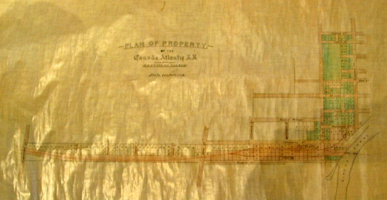 Item #30188 Plan of Property. -of the Canada Atlantic R.R. and Promoters Thereof. Scale 200 feet to 1 inch. Manuscript Map. On coated linen, in black & two colours, Plan includes from east west Gilmour, Argyle, Catharine and Isabella Streets., and from north to south; the Rideau Canal at Pretoria Bridge, Cartier, Elgin, Metcalfe, O'Connor, Bank to Concession Street. (Bronson ?). Lots are numbered. MAP, Ottawa Manuscript Property Map.